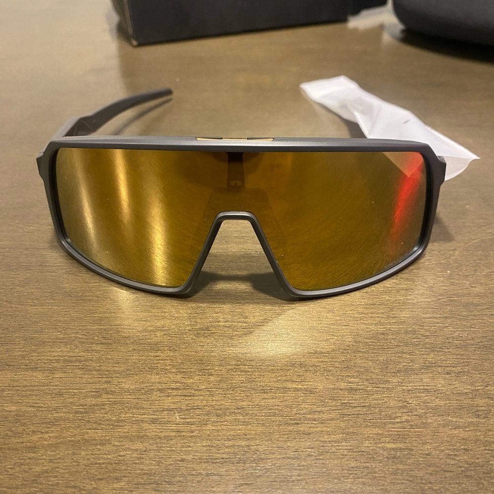 Oakley Sleek Black Sunglasses with Gold Lens